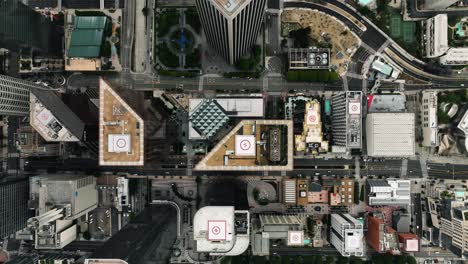 Aerial-view-above-downtown-Los-Angeles,-in-cloudy-CA,-USA---top-down,-drone-shot
