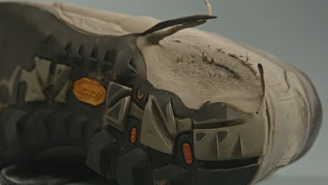 Zoom-in-to-worn-heel-of-shoe-sole-of-hiking-boot
