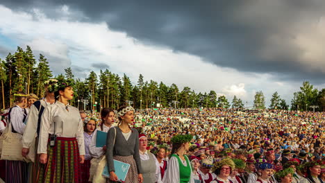People-gathering-at-Latvian-Song-and-Dance-Festival-wearing-traditional-dress