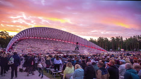 A-time-lapse-of-a-capacity-crowd-gathering-to-watch-a-Traditional-Concert-at-a-modern-stadium