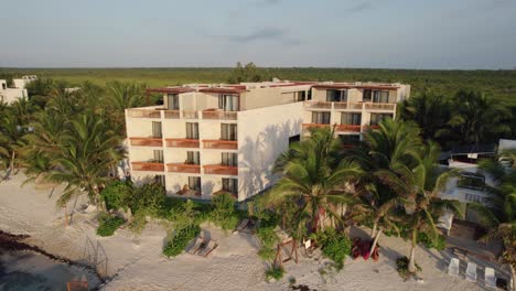 Hotel-Alea-in-Tulum-aerial-close-up-to-wide-view-of-building-and-beach