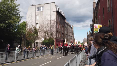 A-small-crowd-of-young-people-filming-and-photographing-the-Kings-Household-Cavalry-in-Edinburgh
