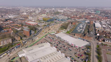 Static-aerial-shot-of-Hull-and-traffic-moving-along-the-A63-whilst-works-undertaken-to-build-a-new-underpass