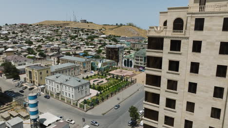 Cityscape-Of-Istaravshan-During-Summer-In-Tajikistan---aerial-drone-shot