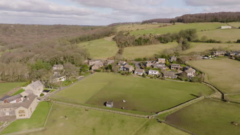 Flying-over-an-idyllic-countryside-village-in-a-West-Yorkshire-valley