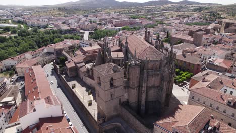 Roman-catholic-cathedral-in-Plasencia,-Spain,-aerial-orbit-on-a-sunny-day