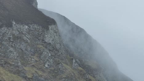 Close-up-drone-shot-of-the-Achill-cliffs-during-a-cloudy-morning