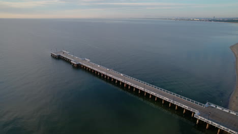 Aerial-View-Pier-On-The-Idyllic-Baltic-Sea-In-Orlowo-During-Sunrise-In-Gdynia