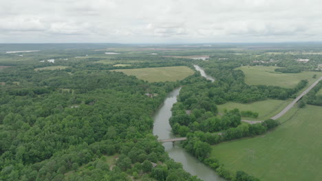 Summer-green-landscape---Drone-flight-over-Bluff-Hole-Park,-Mulberry,-Arkansas,-USA
