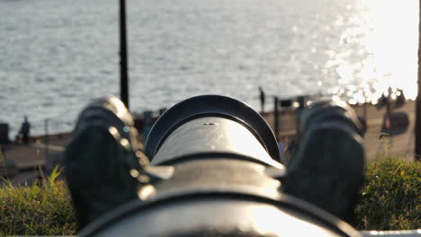 Cannon-at-Akershus-Fortress-Towards-Oslo-Fjord-at-Sunset