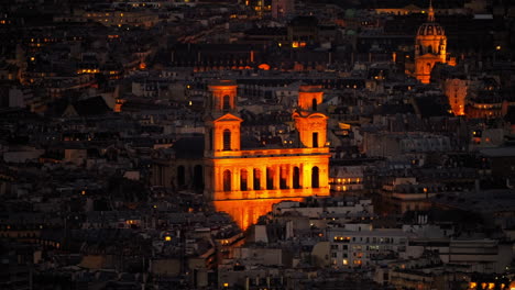 Cityscape-view-from-above-of-the-Church-of-Saint-Sulpice-in-Paris,-illuminated-at-night,-France