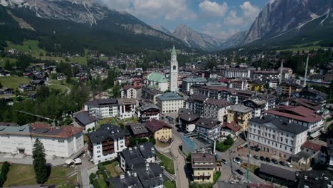Cinematic-Shot-Of-Cortina-Town-Center-Surrounded-By-Dolomites-Mountains-,-Italy