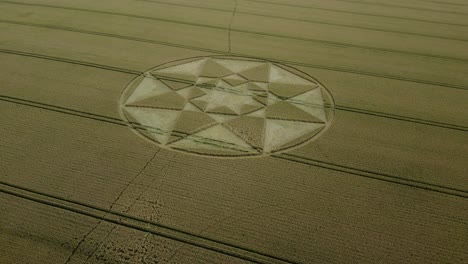 Micheldever-crop-circle-2023-aerial-view-establishing-shot-across-wheat-field-and-Hampshire-countryside