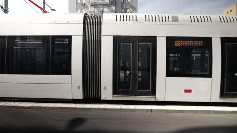 Train-arriving-at-the-train-station,-new-public-transport-train-in-Tel-Aviv,-Israel