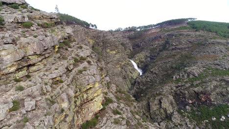 Fisgas-de-ermelo-waterfall-drone-aerial-view-in-Mondim-de-Basto,-most-beautiful-in-Portugal