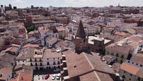Cáceres'-Iglesia-de-Santiago-el-Mayor,-church-in-Spain's-historic-charm---Aerial