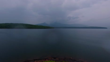 Beautiful,-atmospheric-summer-time-lapse-of-a-lake-in-the-Appalachian-mountains-during-a-stormy,-rainy-day