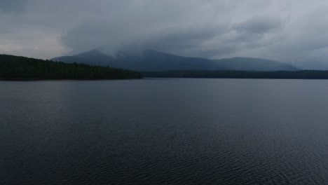 Stunning-time-lapse-of-a-dark,-atmospheric-foggy-rainy-lake-in-the-Appalachian-mountains