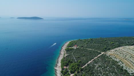 Aerial-wide-video-of-Veli-Drvenik-island-and-other-small-islands-in-the-horizon