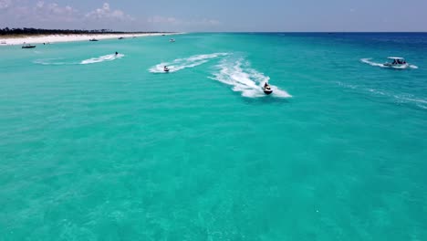 two-Jet-skies-in-the-crystal-clear-turquoise-water-of-the-Shell-Island-of-Florida’s-Emerald-Coast