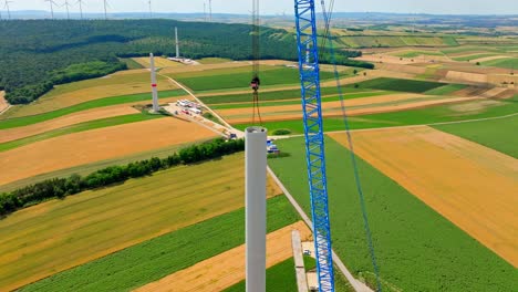 Worker-On-Top-Of-Wind-Turbine-Tower-During-Construction-At-Wind-Park-In-Austria
