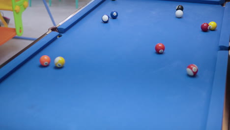 Pool,-Pocket-Billiards-Complicated-Scoring---Woman-Hits-Cue-Ball,-It-Bounces-And-Sinks-Goes-Down-a-Pocket-Hole