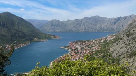 Kotor-Bay-and-Kotor-Town,-sea-and-mountains,-establishing-shot,-Montenegro