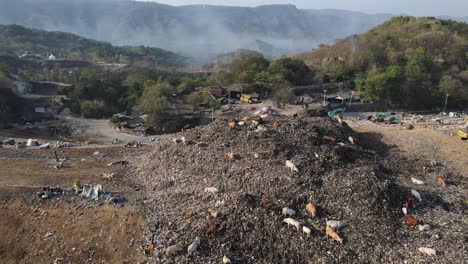 Aerial-view,-huge-mountains-of-garbage-piled-up-at-the-Piyungan-landfill,-Yogyakarta