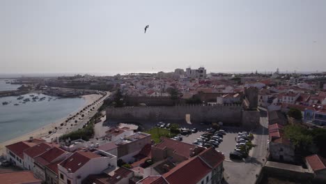 Aerial-establishing-coastal-city-Sines-in-Portugal,-cityscape-sunny-summer-day