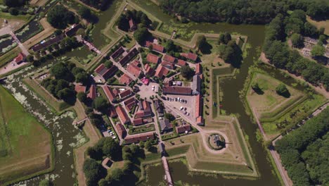 Top-down-view-of-famous-Fortress-Bourtange-in-Netherlands-during-summer,-aerial