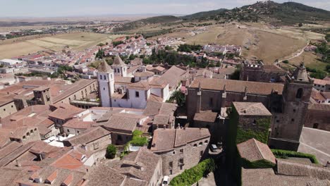 Aerial-lateral-view:-San-Francisco-Javier-and-San-Mateo-churches,-Cáceres,-Spain