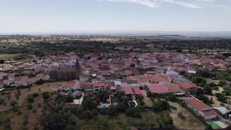 Aerial:-Tejeda-de-Tietar-village-nestled-in-rural-countryside,-Spain