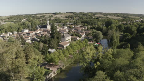 Aerial-drone-point-of-view-of-the-village-of-Saint-Loup-Lamaire-in-Deux-Sevres,-France