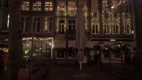 Dolly-to-the-right-of-empty-bars-and-restaurants-Vrijthof-Maastricht