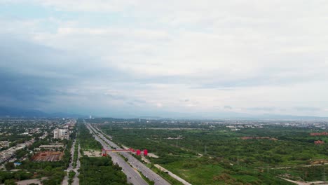 Aerial-drone-view-of-the-beautiful-green-landscape-beside-Kashmir-highway-in-Islamabad---Beauty-of-Islamabad-Pakistan---14th-August