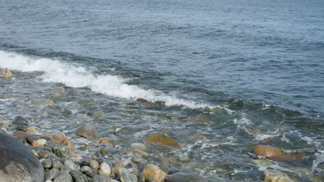 Splashing-Sea-Waves-On-The-Rocky-Beach-In-Norway---high-angle