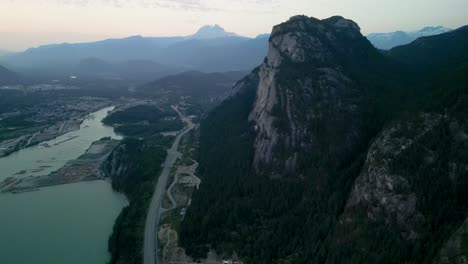 Aerial-morning-view-of-Stawamus-Chief,-Mount-Garibaldi-and-Squamish,-Canada