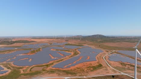 Campo-De-Turbinas-Eólicas-Y-Granjas-Solares-De-Paneles-Que-Producen-Energía-Renovable