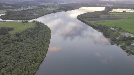 Maroochy-River-With-Sky-Reflection-In-Sunshine-Coast-Region,-Queensland,-Australia---aerial-shot