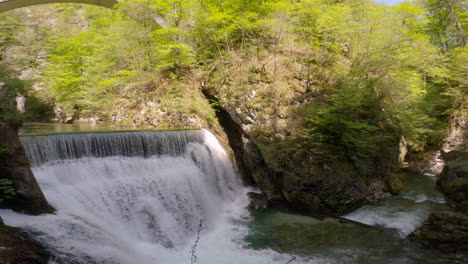 Wide-shot-of-a-waterfall-at-Vintgar-Gorge,-Triglav,-Slovenia