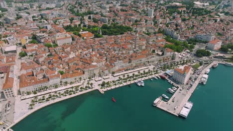 Beautiful-old-roman-city-skyline-of-Split,-Croatia,-aerial-orbit,-summer-day