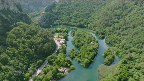 Aerial-view-of-Cetina-river-canyon-near-the-city-of-Omis,-Croatia