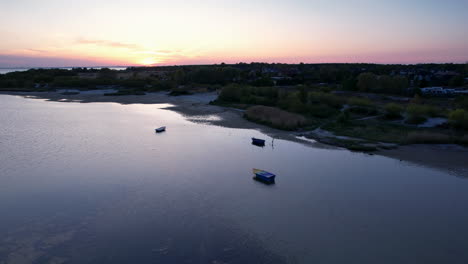 Aerial---A-beautiful-sunset-on-the-shore-of-the-Puck-Bay-in-Jastarnia