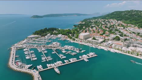 Aerial-view-picturesque-yacht-port-on-Split-coastline,-sunny-summer-day,-Croatia