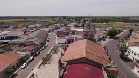 Church-Parroquia-De-Santiago-Apóstol-in-the-Spanish-village-Torremayor,-aerial
