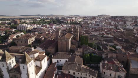 Aerial:-San-Francisco-Javier-and-San-Mateo-churches,-Cáceres,-Spain---historic-buildings