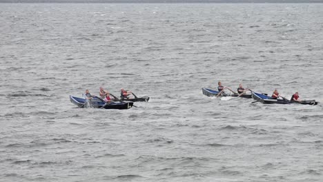 Competitors-vigorously-row-currach-boats-through-open-rough-seas