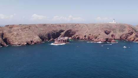 Aerial:-Portugal's-Berlengas-Archipelago,-fort-and-lighthouse-in-the-backdrop
