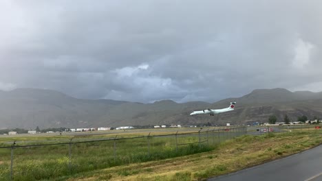 Braving-the-Haze:-A-Passenger-Plane-Descends-at-Kamloops-Airport-Amid-the-Smoke-from-the-Ross-Moore-Lake-Wildfire