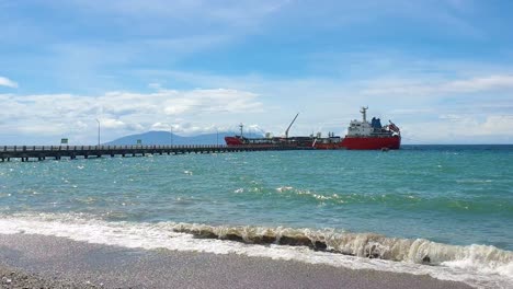 Tanker-ship-vessel-docked-and-delivering-oil,-petroleum-products,-and-other-liquid-cargoes-in-the-capital-Dili,-Timor-Leste,-Southeast-Asia